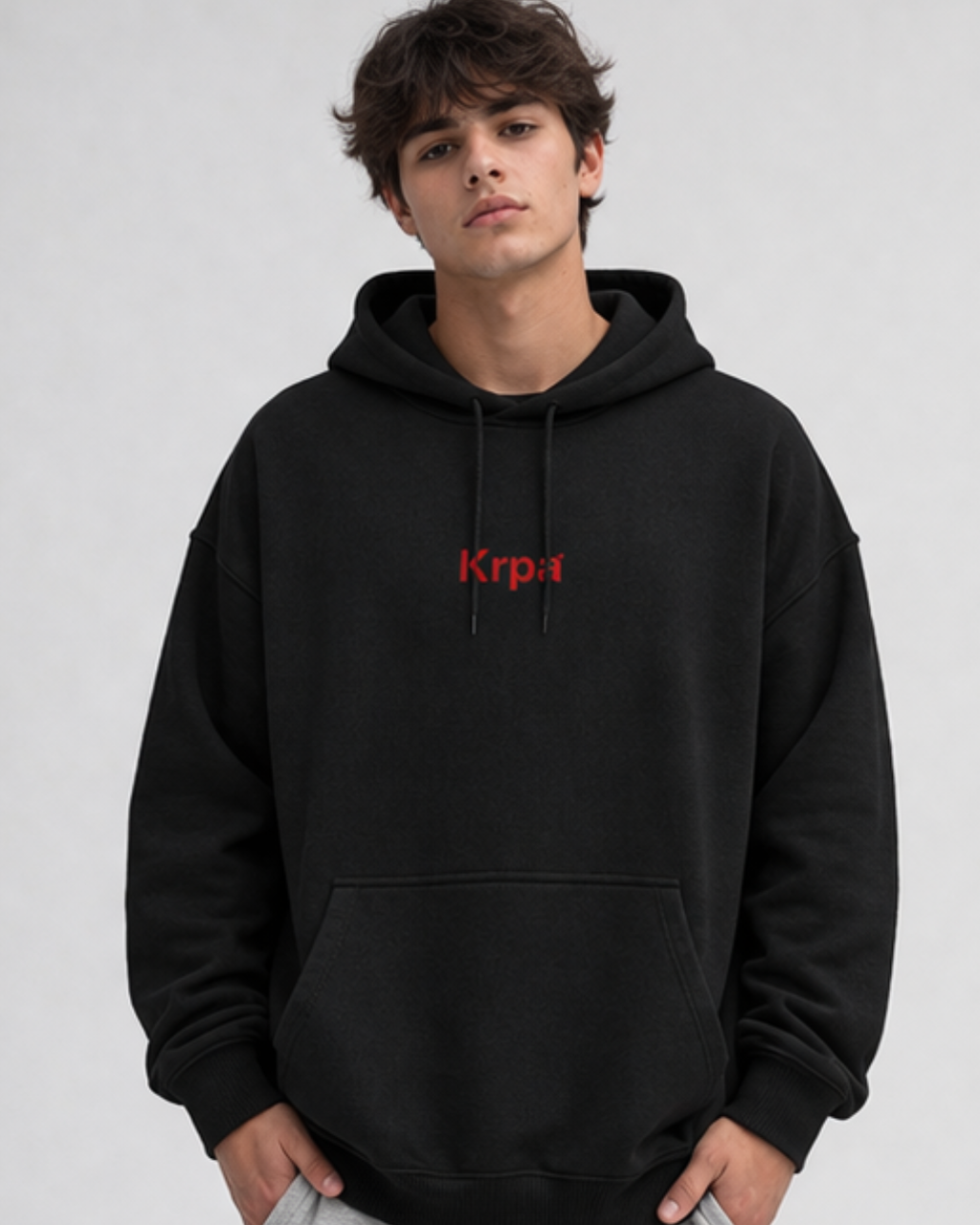 Black oversized hoodie for men with KRPA logo in centre