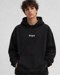 Black essential oversized hoodie for men with subtle white KRPA logo