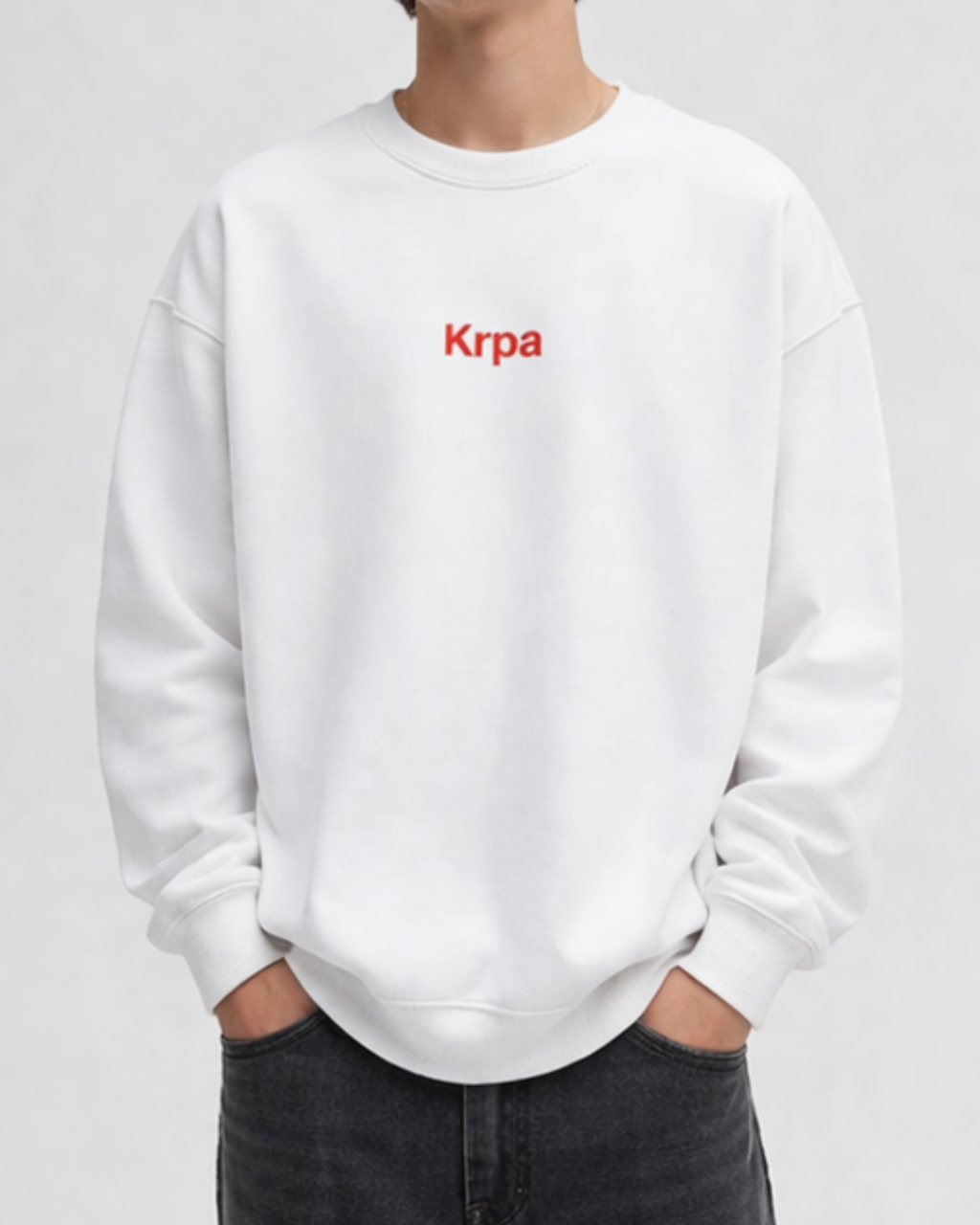 White oversized crewneck sweatshirt for men with red KRPA print, relaxed cotton blend fit