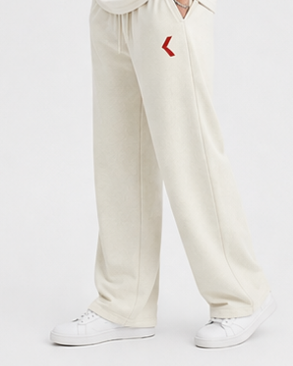 White pants with KRPA logo on a white background