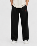 Black relaxed fit lounge pants for men with KRPA logo and minimal design