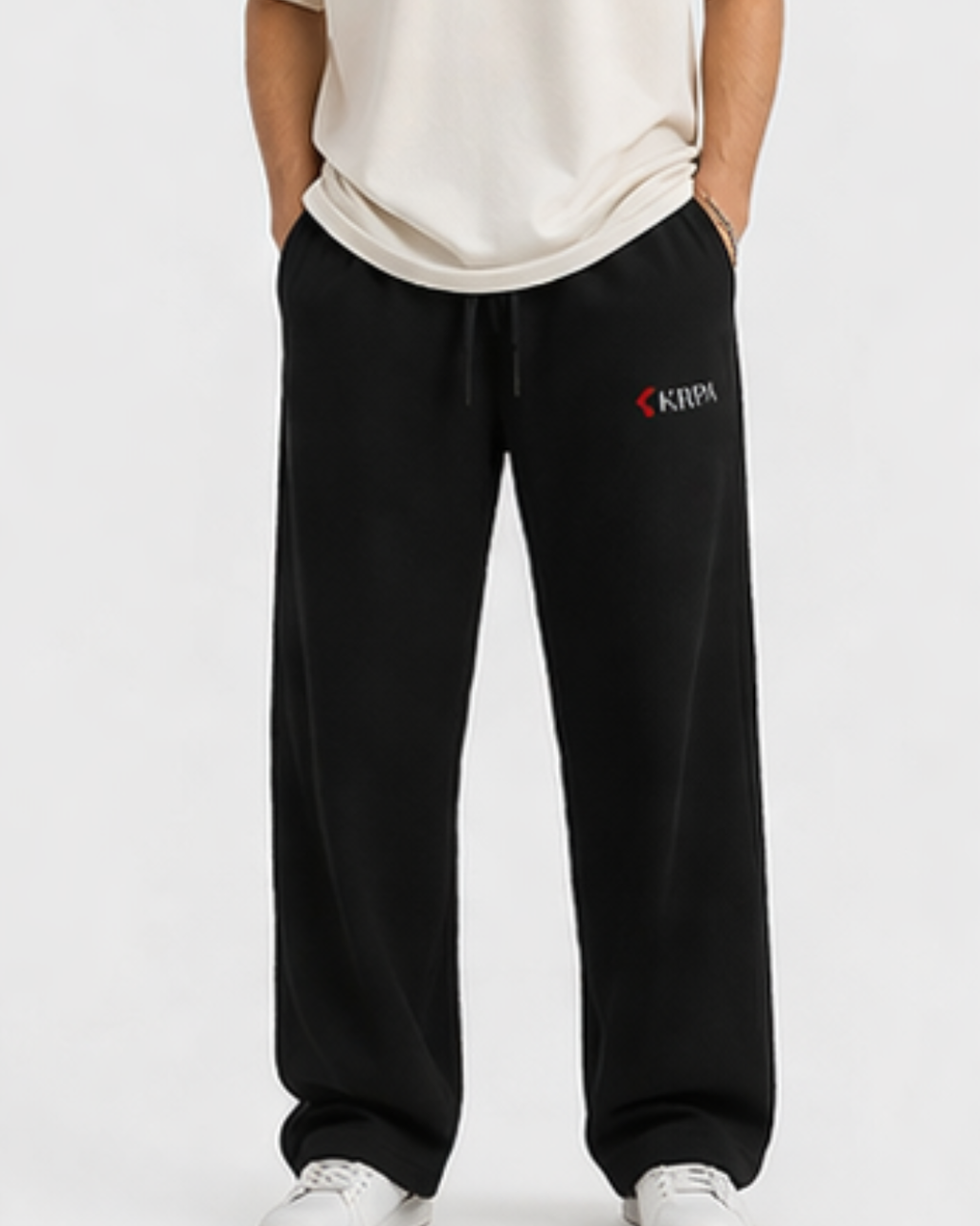 Black relaxed fit sweatpants for men with KRPA logo and drawstring waist