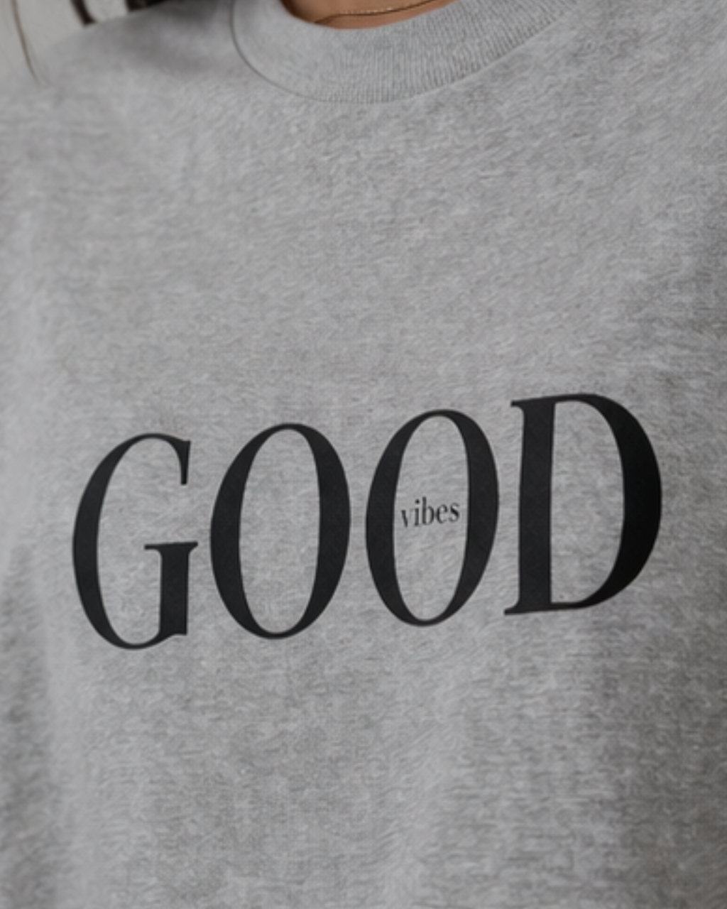 Grey cotton oversized t-shirt with 'GOOD vibes' text in black