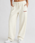 White sweatpants with gratitude written on a white background