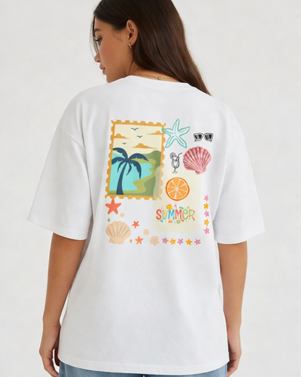 Person wearing a white t-shirt with a colorful summer-themed design on the back.
